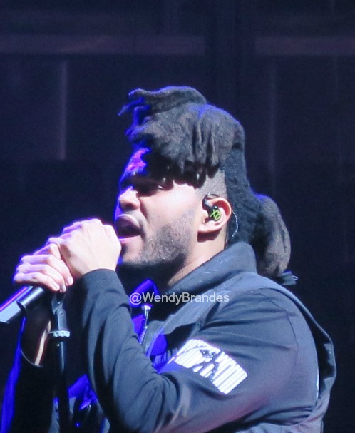 I like that you can see the "XO" on his personalized in-ear monitors.